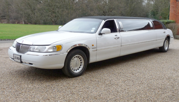 white Town Car childrens party limos class=