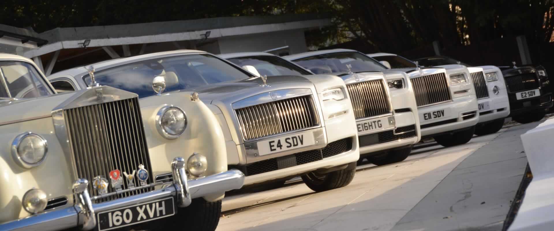 Line of modern and classic Rolls-Royce cars